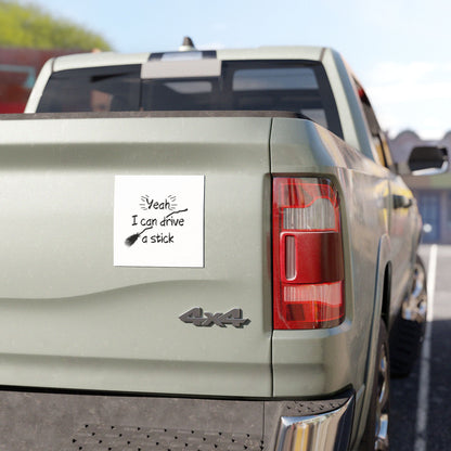 Spooky Car Sticker is perfect gift for any boo box. At the top, in bold, whimsical font, it reads: Yeah I Can Drive Stick! Below this text, there's an image of a classic witch's broomstick, complete with a few magical sparkles around it. 