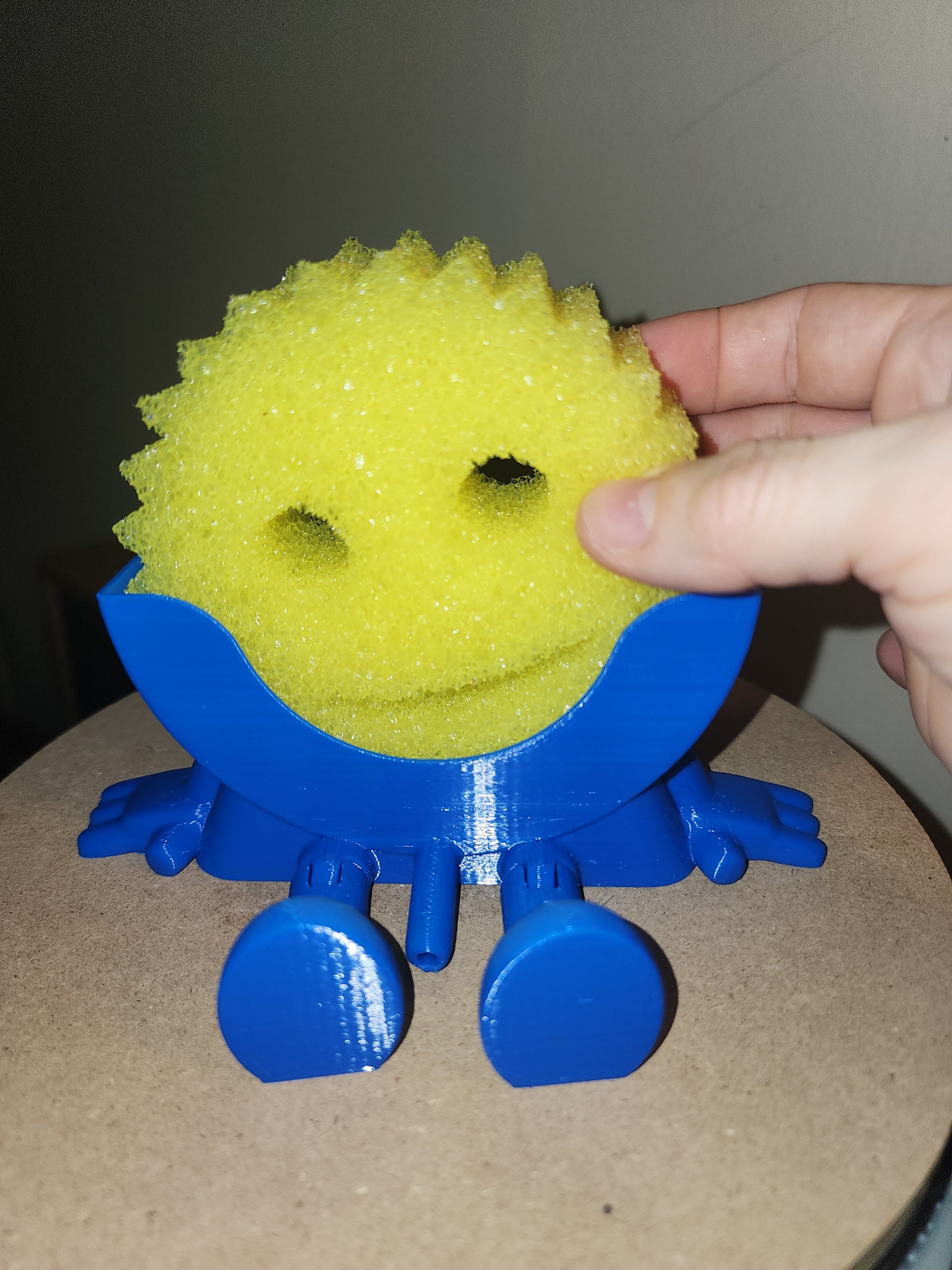 Meet Mr. Dripper, the tidy little helper your sink has been waiting for. Designed specifically to hold your Scrub Daddy, this clever sponge holder keeps your sponge upright, dry, and always within reach.

No more soggy sponges or cluttered sink edges, Mr. Dripper allows proper airflow so your Scrub Daddy dries faster and stays fresher between uses. Its compact, sink-friendly design fits perfectly near the faucet, making daily cleanup easier and more organized.