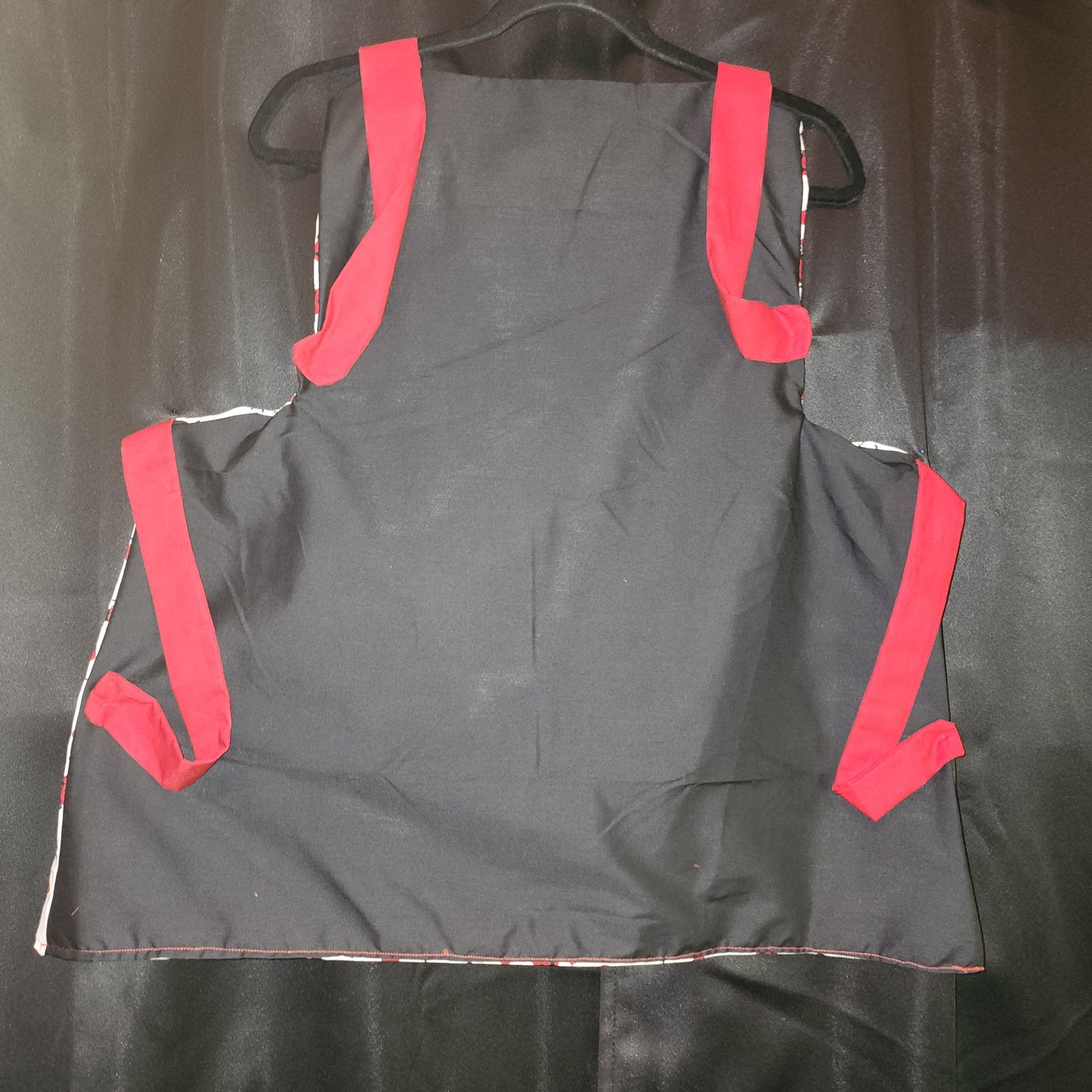 Make Valentine’s Day extra sweet with our Love Bug Child Apron, thoughtfully handmade to match our coordinating adult apron for the perfect parent-and-child kitchen duo. Featuring an all-over ladybug and heart print with charming red accents, this apron is designed to bring fun, love, and creativity into every little helper’s cooking or crafting adventure.