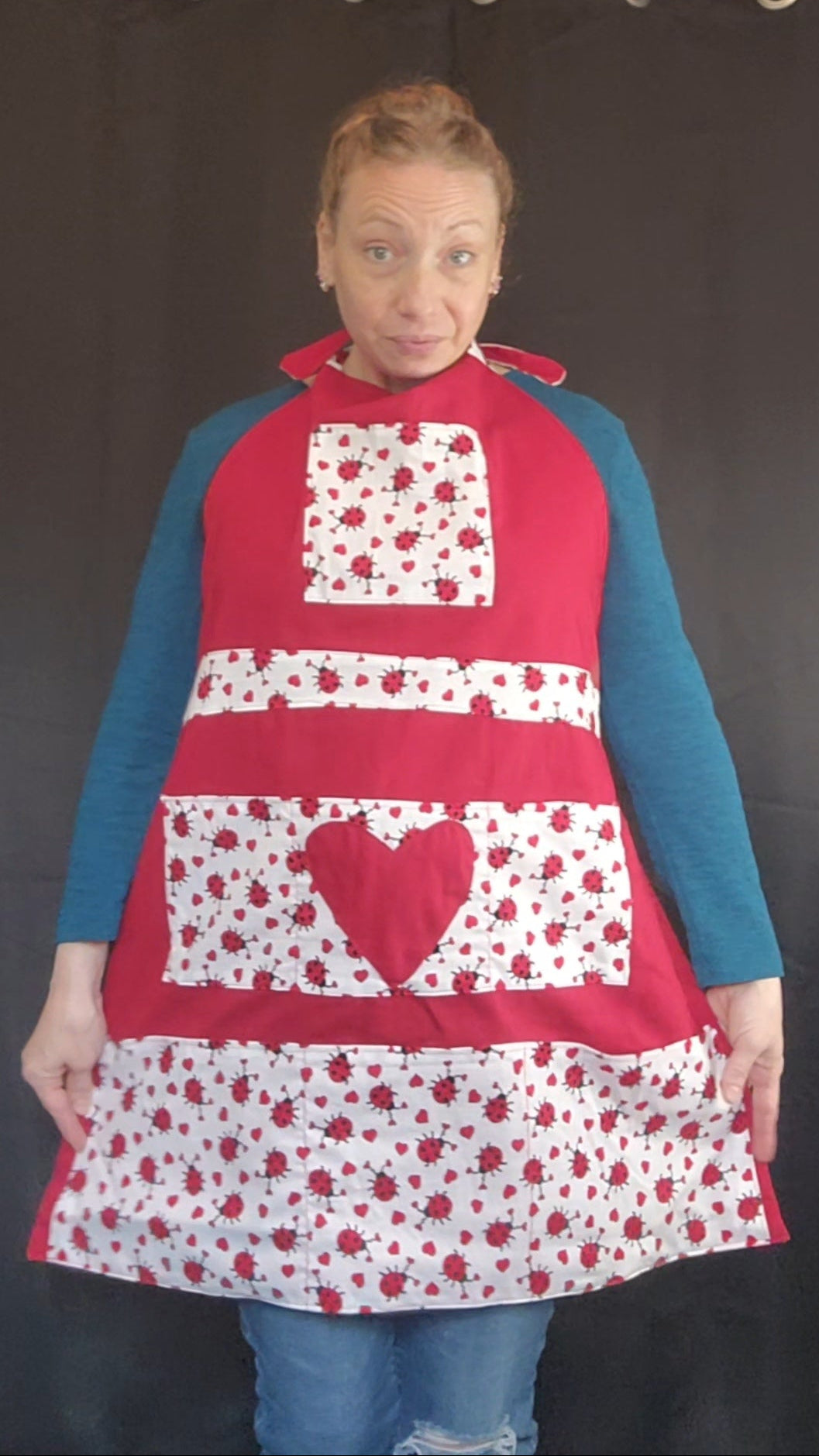 Celebrate this Valentine's Day with love in the kitchen in our charming Love Bug adult apron! Handmade with care, this apron features 7 pockets with a rich red base accented by an adorable ladybug-and-heart print that brings playful Valentine vibes to any bake day or dinner prep.