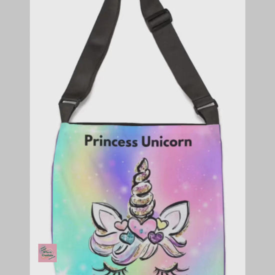 Step into a soft, dreamy world of pastel magic with this Princess Unicorn Crossbody Bag. Designed with a whimsical rainbow background and an adorable unicorn face, this bag brings a touch of sparkle and imagination to everyday life.